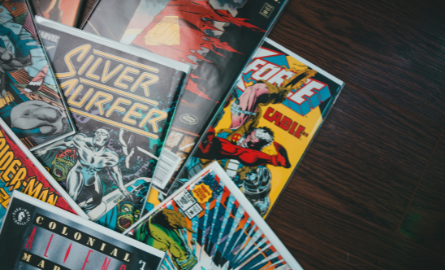 Comic books spread on a table