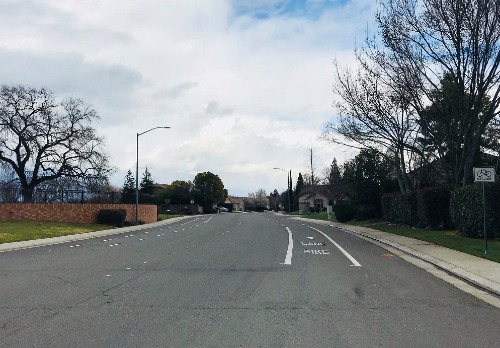 photo of roadway with share the lane markings