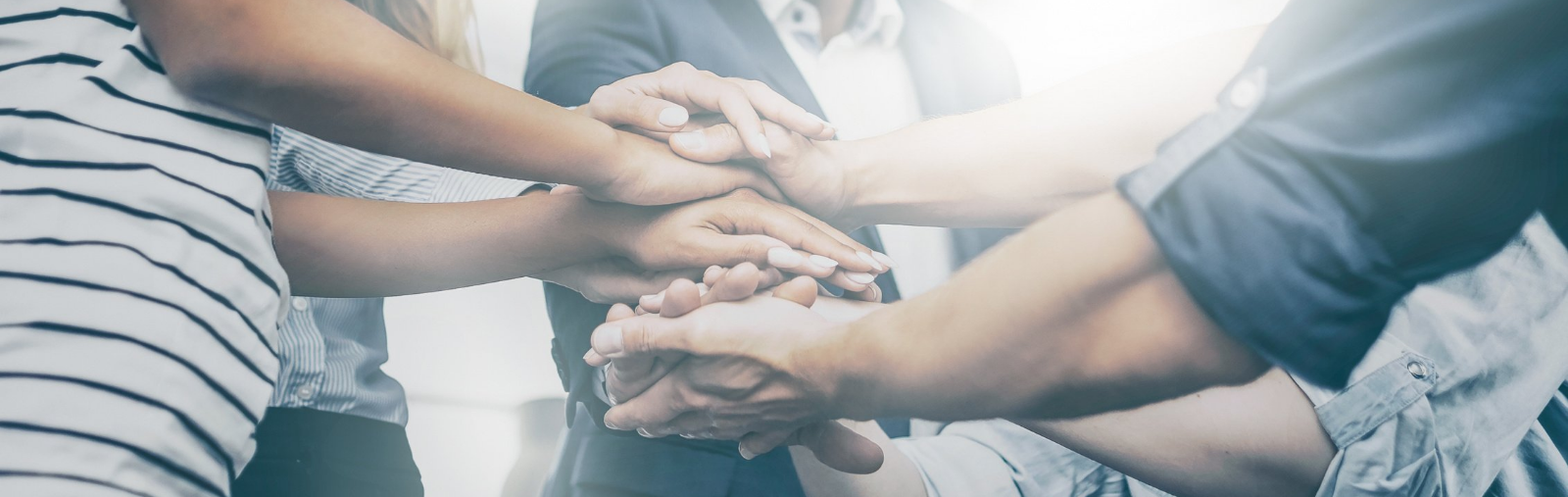 People stacking hands.