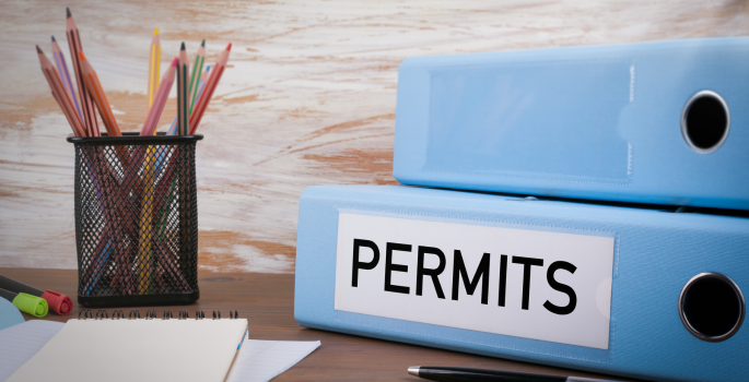 permit binders on desk
