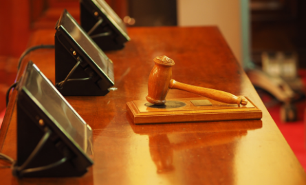 Gavel on desk.