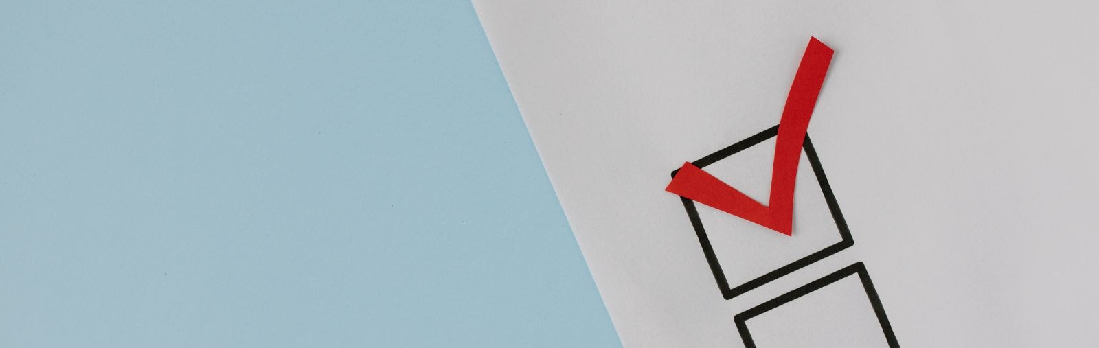 A red checkmark in a survey box