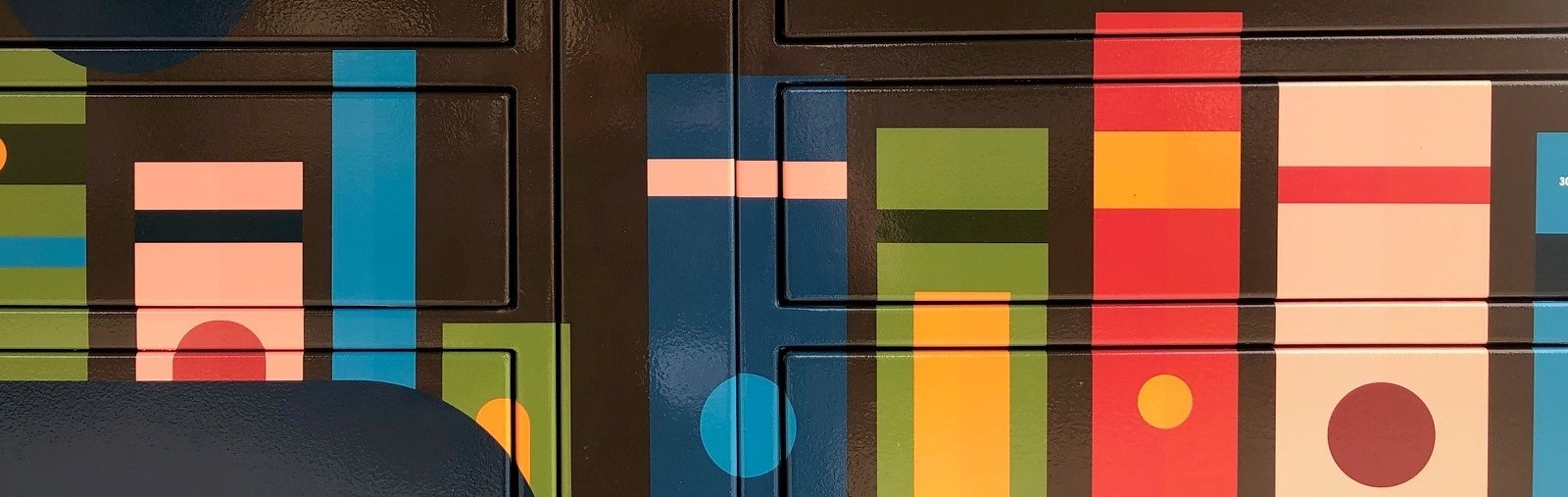 Close up of the Book Locker decorated with graphics of books