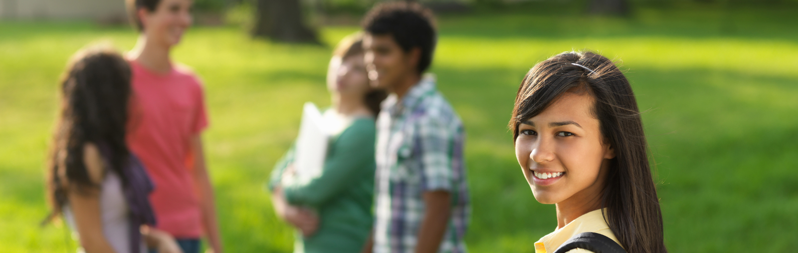 A group of teenagers working together, waiting for you to join them.