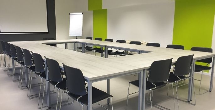 An empty meeting room with screen