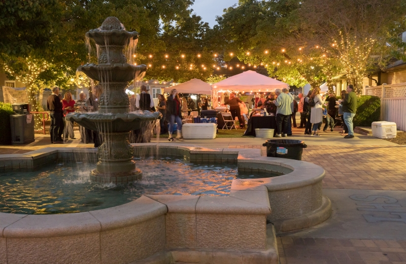 event at night in plaza with lights