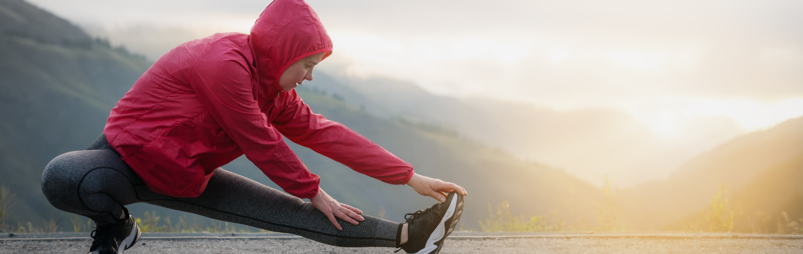 women stretching outside before exercise