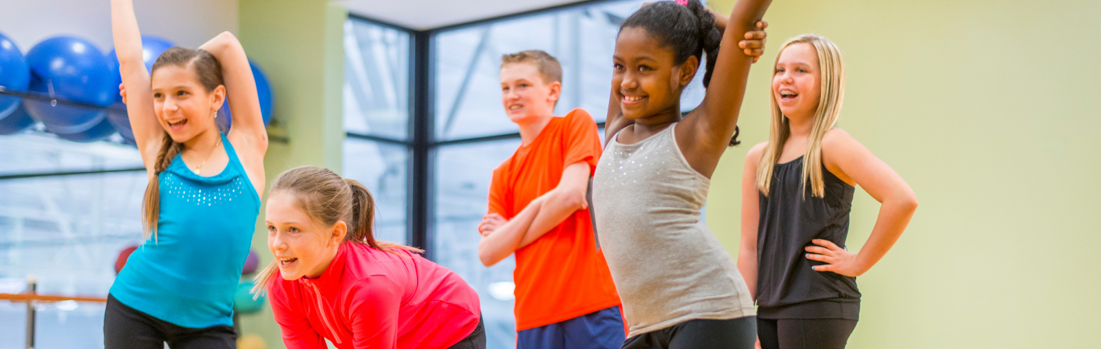 children stretching in a dance class