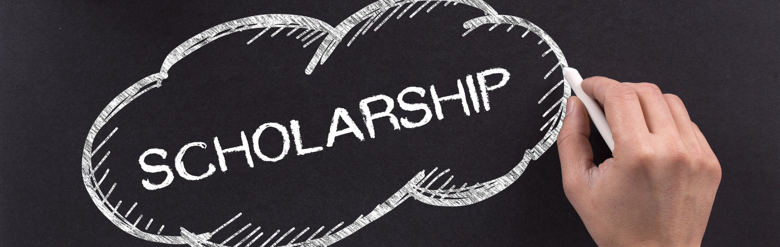 Scholarship written on chalkboard