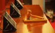 alt="Gavel on desk."