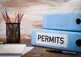 alt="Binder with permit label"